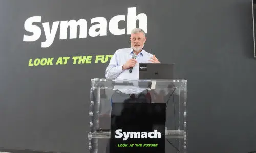 Osvaldo Bergaglio, President of Symach, outlines his company’s technology during the Symach factory tour. 